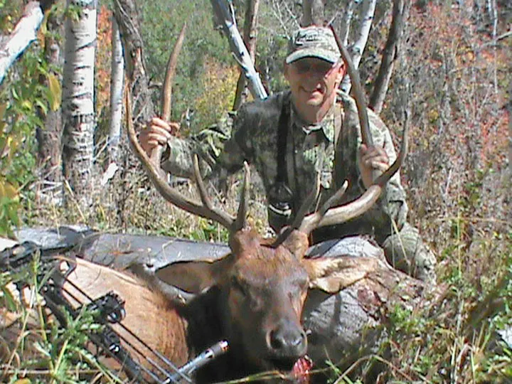 Archery hunter Don Nelson with his bull elk, 2014